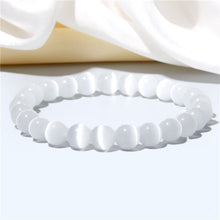 โหลดรูปภาพลงในเครื่องมือใช้ดูของ Gallery White Cat Eye Stone Beaded Bracelet for Women 10 mm - Elegant Jewelry Piece
Wh